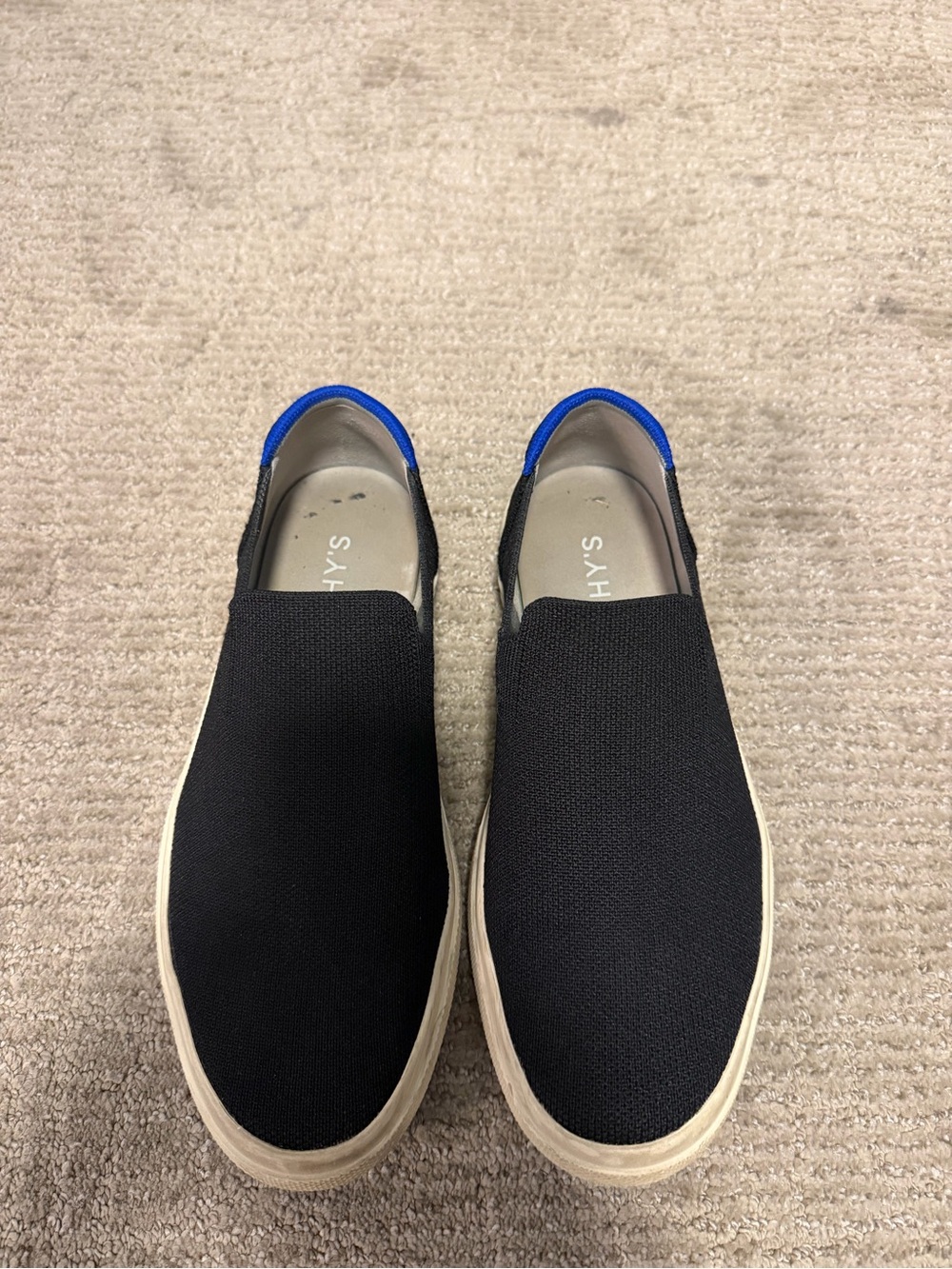 Rothy’s Original Slip-On Sneaker (Black with Blue Heel Accent)